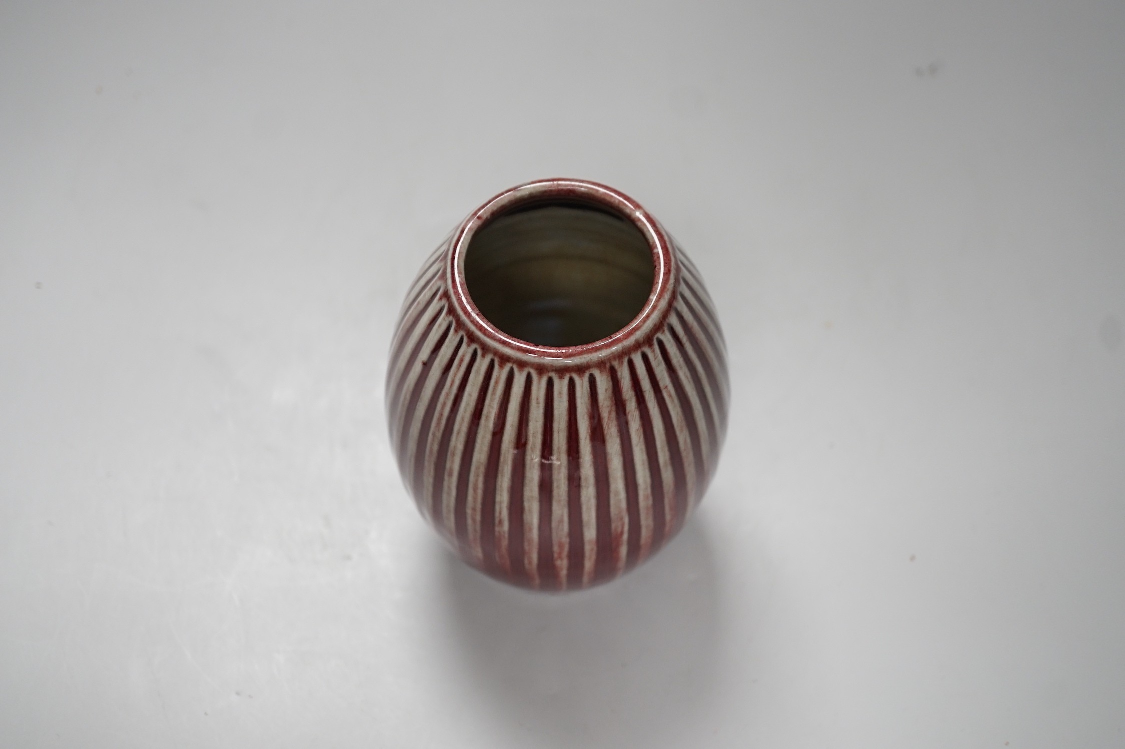 A Chinese Sang De Boeuf vase, 15cm
